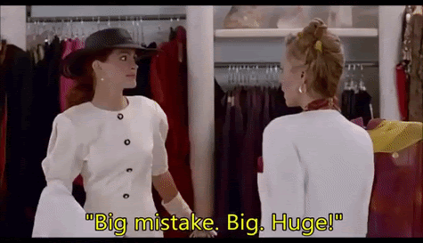 A gif from the movie "Pretty Woman" where the character Vivian Ward, played by Julia Roberts, flaunts her shopping bags to a rude saleswoman saying "Big mistake. Big. Huge!"